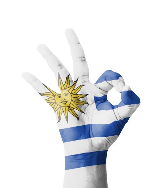 Hand making Ok sign, Uruguay flag painted as symbol of best qual — Stock Photo, Image