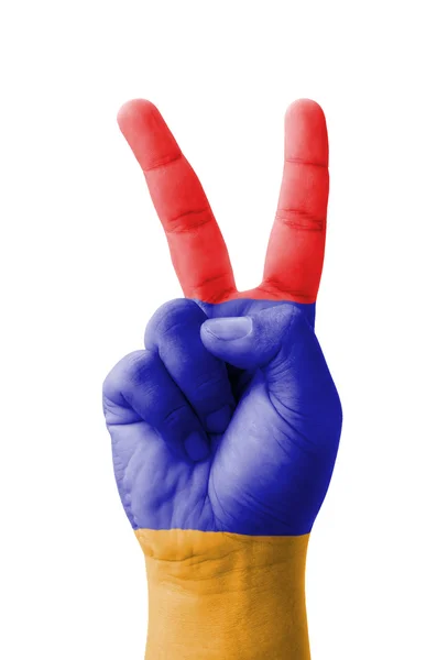 Hand making the V sign, Armenia flag painted as symbol of victor — Stock Photo, Image