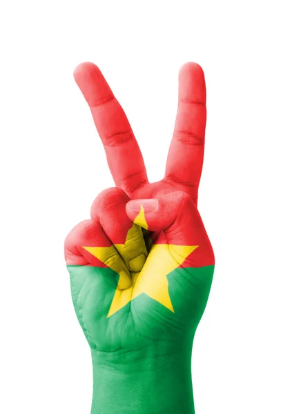Fait à la main le signe V, drapeau du Burkina Faso peint comme symbole de v — Photo
