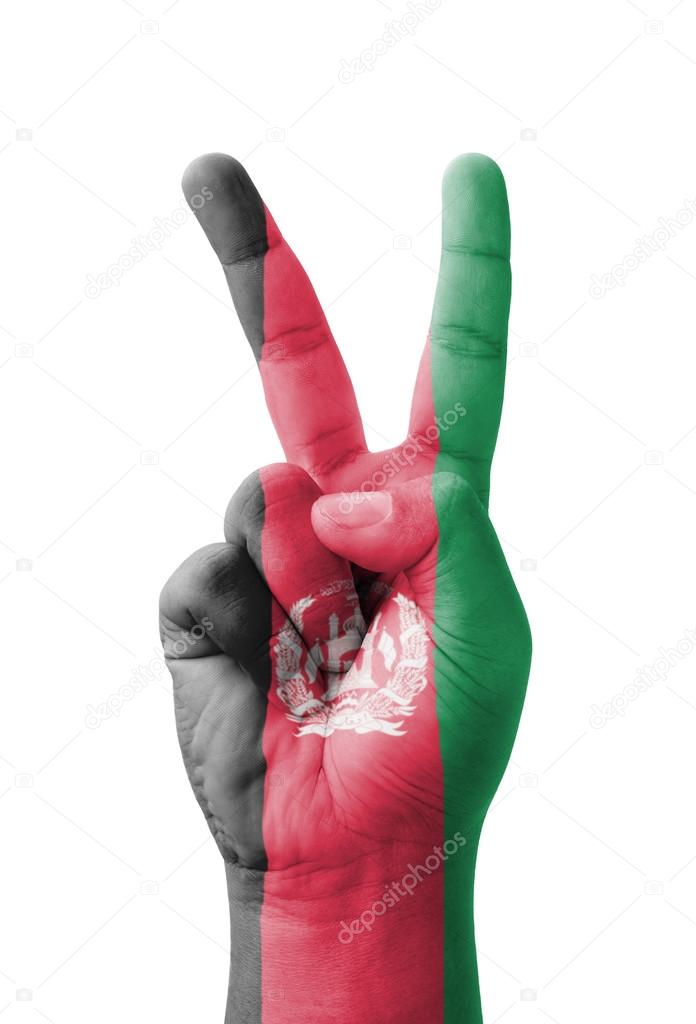Hand making the V sign, Afghanistan flag painted as symbol of vi
