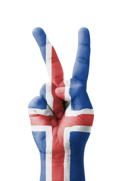 Hand making the V sign, Iceland flag painted as symbol of victor — Stock Photo, Image
