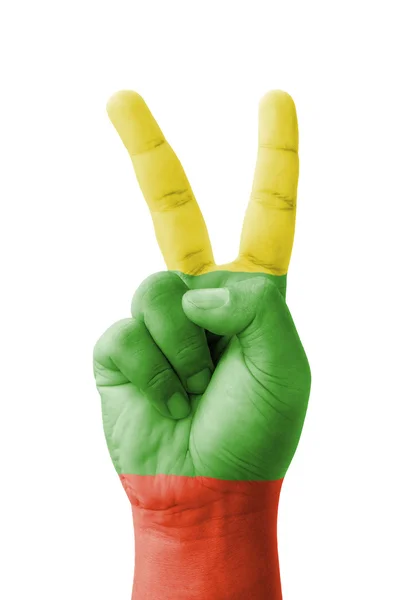 Hand making the V sign, Lithuania flag painted as symbol of vict — Stock Photo, Image