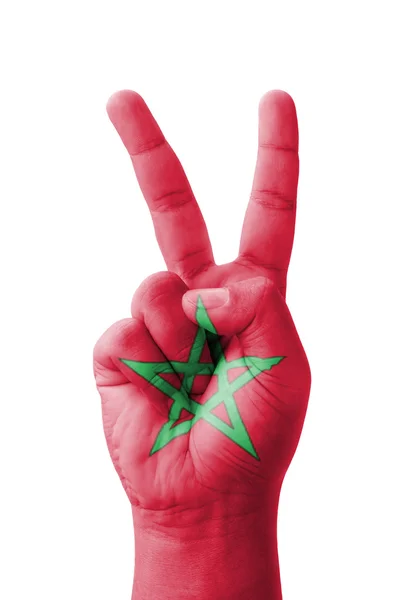 Mano haciendo el signo V, bandera de Marruecos pintada como símbolo del vencedor — Foto de Stock