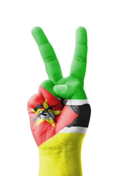 Hand making the V sign, Mozambique flag painted as symbol of vic — Stock Photo, Image