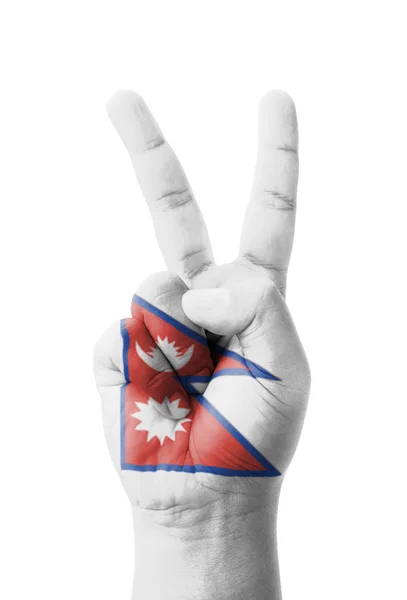 Hand macht das V-Zeichen, nepal Flagge gemalt als Symbol des Sieges, — Stockfoto