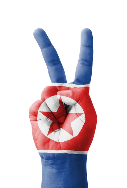 Mão fazendo o sinal V, bandeira da Coreia do Norte pintado como símbolo de vi — Fotografia de Stock