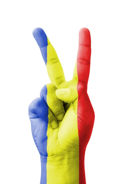Mano haciendo el signo V, bandera de Rumania pintada como símbolo del vencedor — Foto de Stock