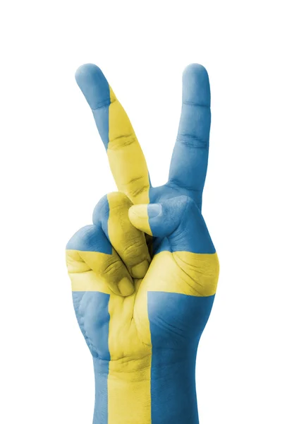 Hand making the V sign, Sweden flag painted as symbol of victory — Stock Photo, Image