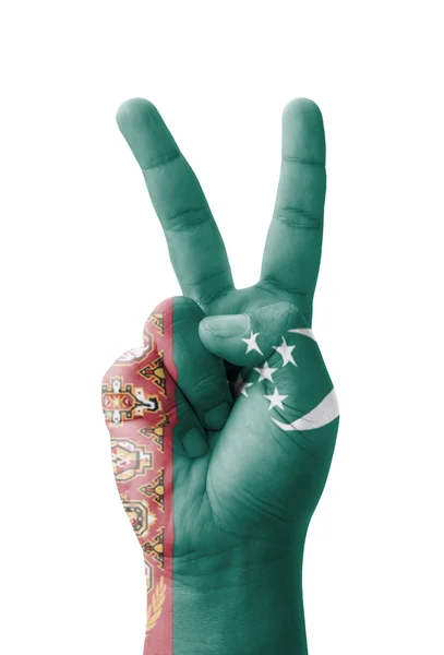 Hand making the V sign, Turkmenistan flag painted as symbol of v — Stock Photo, Image