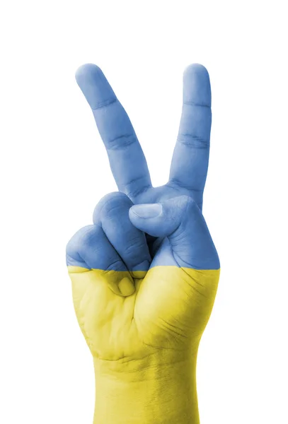 Main faisant le signe V, drapeau de l'Ukraine peint comme symbole de vainqueur — Photo