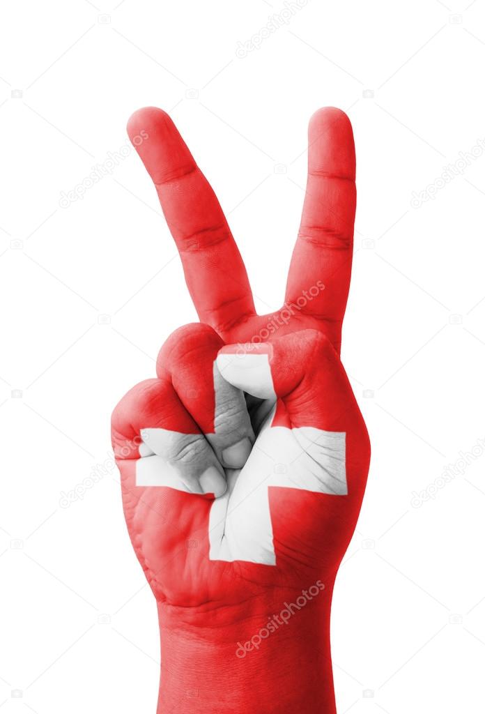 Hand making the V sign, Switzerland flag painted as symbol of vi