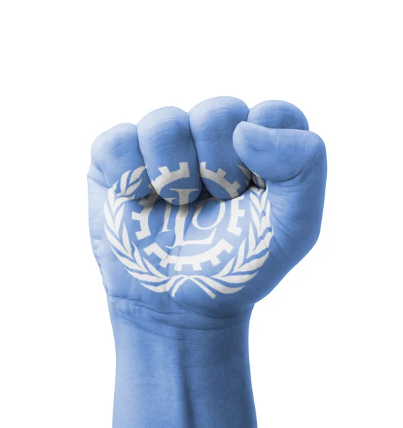 Fist of ILO (International Labour Organization) flag painted, mu — Stock Photo, Image