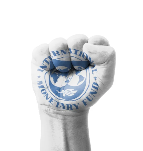 Fist of IMF (International Monetary Fund) flag painted, multi pu — Stock Photo, Image