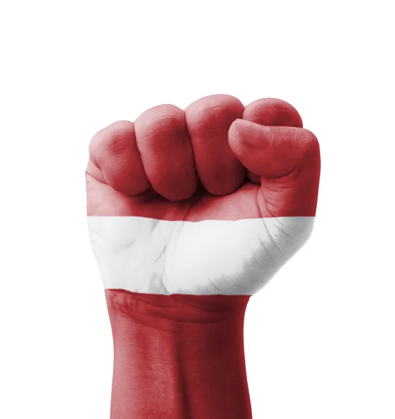 Fist of Latvia flag painted, multi purpose concept - isolated on — Stock Photo, Image