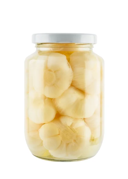 Seasoning pickled garlic in glass jar isolated on white backgrou — ストック写真