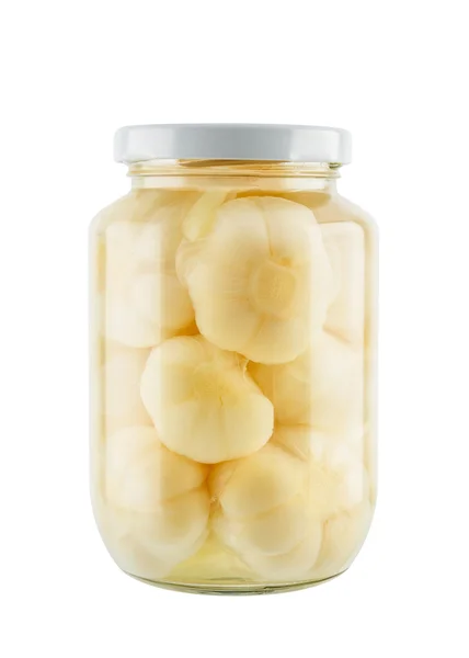 Seasoning pickled garlic in glass jar isolated on white backgrou — ストック写真