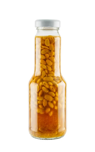 Salted soybean in glass bottle isolated on white background — Stock Fotó