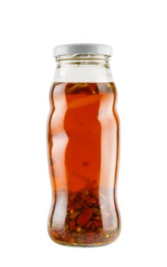 Fish sauce with chili in glass bottle isolated on white backgrou