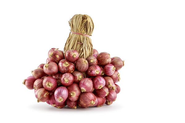 Bunch of shallots isolated on white background