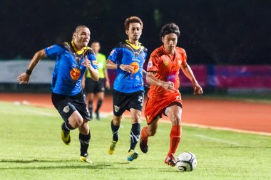 SISAKET THAILAND-MAY 21: Teruzaku Tanaka of Sisaket FC. (orange)