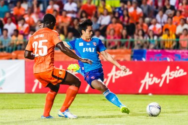 SISAKET THAILAND-JUNE 21: Piyawit Janput of Singhtarua FC. (Blue