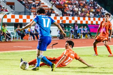 SISAKET THAILAND-JUNE 21: Gorka Unda of Sisaket FC. (Orange) sli