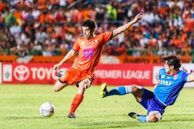 SISAKET THAILAND-JUNE 21: Gorka Unda of Sisaket FC. (orange) sho