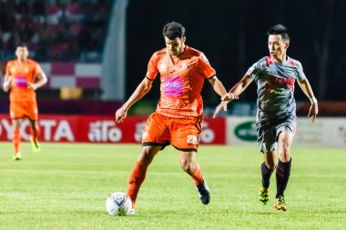SISAKET THAILAND-JUNE 29: Victor Amaro of Sisaket FC. (orange) i