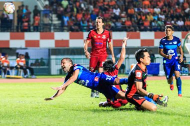 SISAKET THAILAND-AUGUST 12: Thiago Cunha of Chonburi FC (blue) i