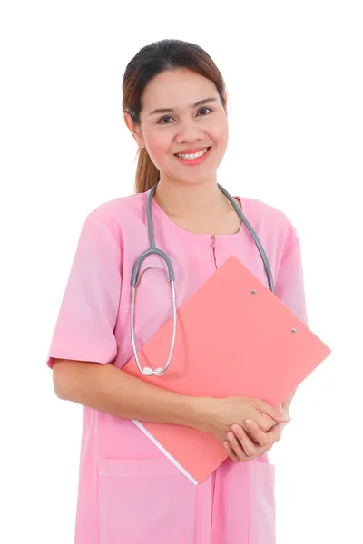 Asian smiling nurse holding clipboard isolated on white backgrou Royalty Free Stock Images