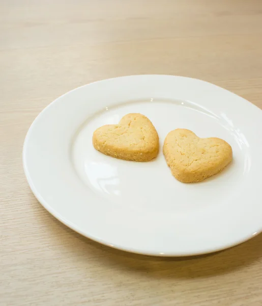 Heart cookies in white plate