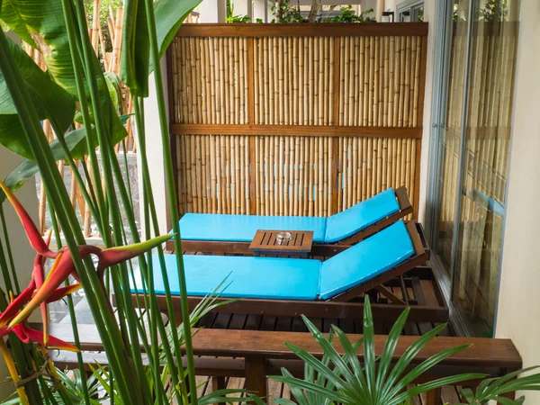 Beach chairs in tropical resort — Stock Photo, Image