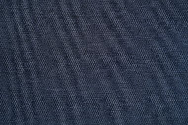 Kumaş kumaş siyah mikrofiber doku arka planı, kumaş tekstil yüzeyinin soyut görüntüsü.