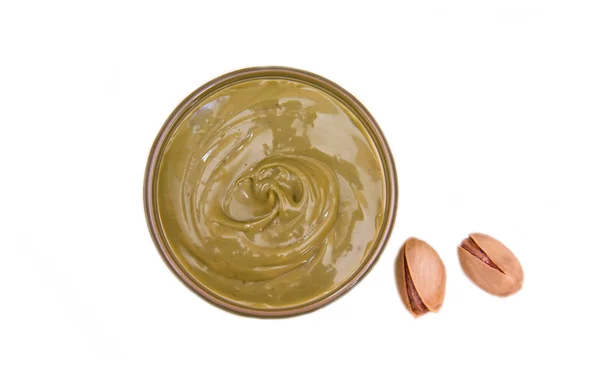 Pistachio cream on bowl top view — Stock Photo, Image