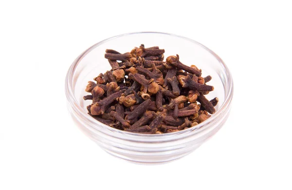 Cloves on bowl — Stock Photo, Image