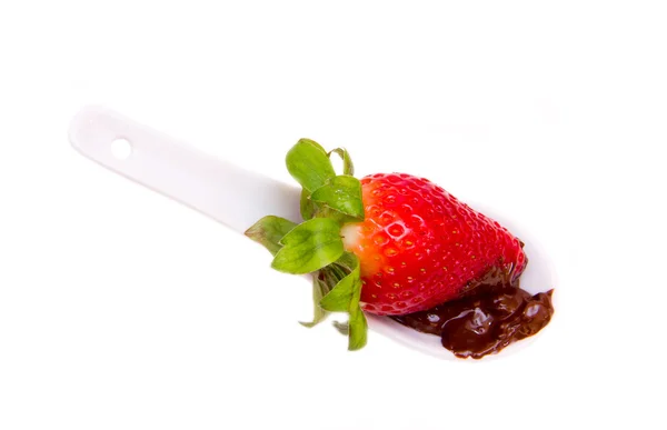 Teaspoon with strawberry and chocolate from above — Stock Photo, Image