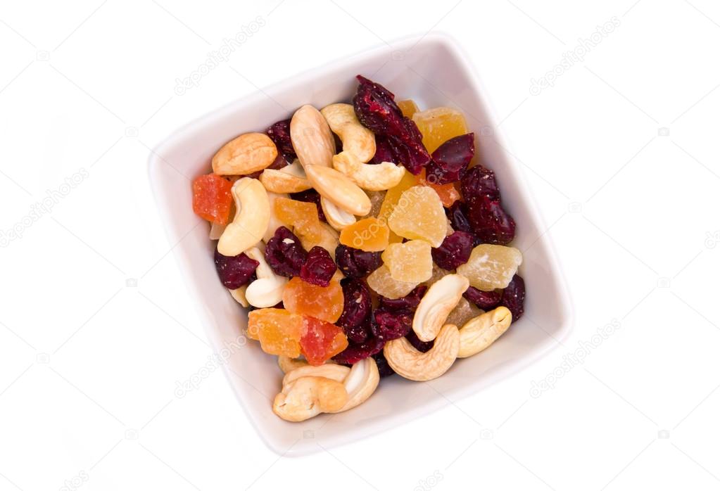 Dried fruits on square bowl seen from above