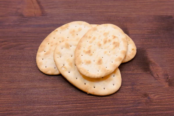 Algunas galletas ovaladas en madera — Foto de Stock