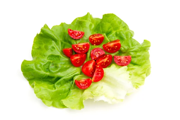 Cherry tomatoes on lettuce — Stock Photo, Image