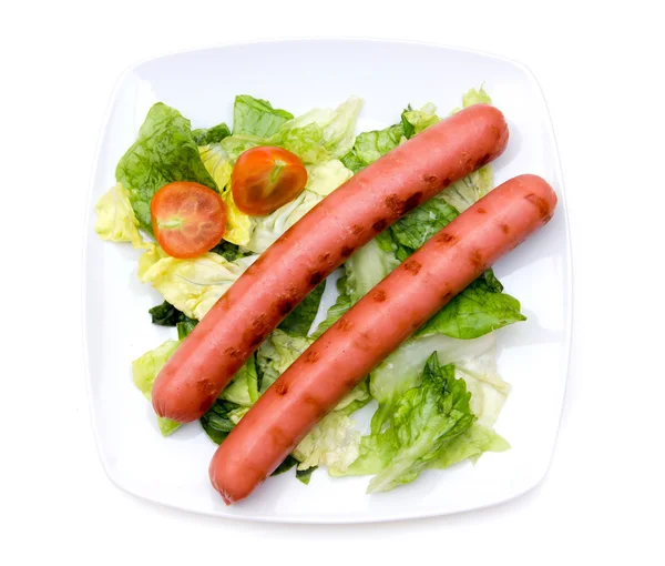 Sausages with salad from above — Stock Photo, Image