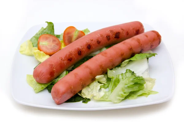 Sausages with salad — Stock Photo, Image