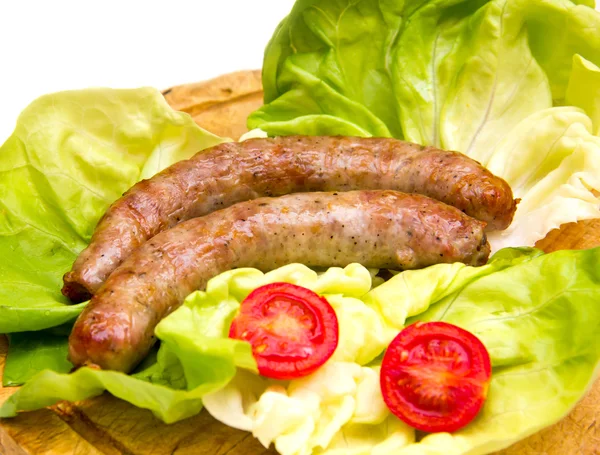 Sausage on cutting board — Stock Photo, Image