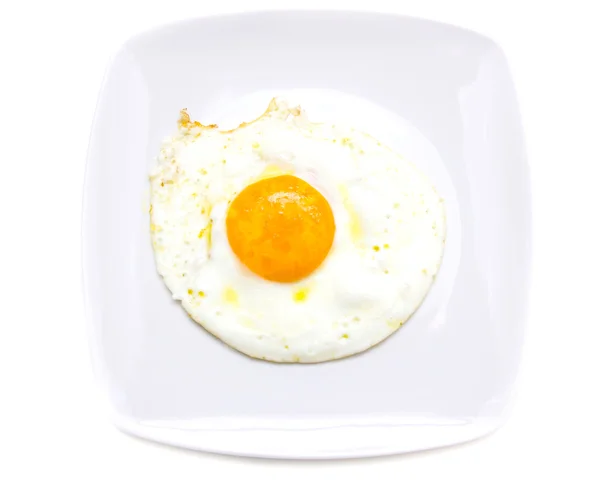 Huevo frito en plato desde arriba —  Fotos de Stock
