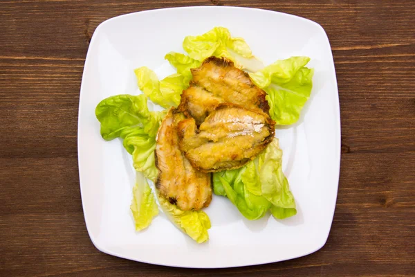 Fried fish on wood from above — Stock Photo, Image