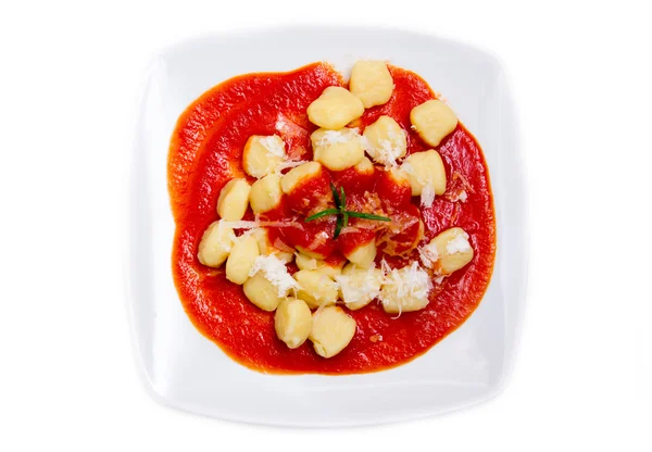 Gnocchi with tomato sauce from above — Stock Photo, Image