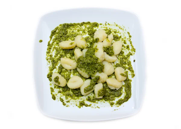 Gnocchi with pesto from above — Stock Photo, Image