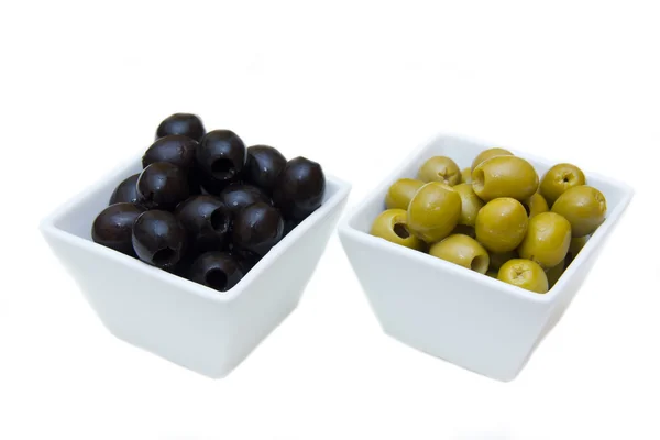 Bowls with green and black olives — Stock Photo, Image