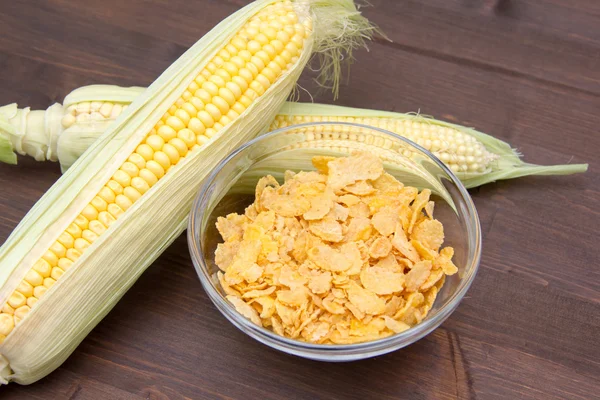 Cereal bowl of corn on wood — Stock Photo, Image
