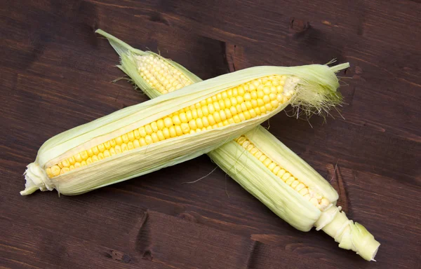 Cobs on wood — Stock Photo, Image