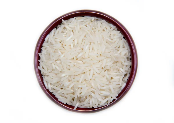 Cuenco con arroz sin cocer de arriba Imagen de stock